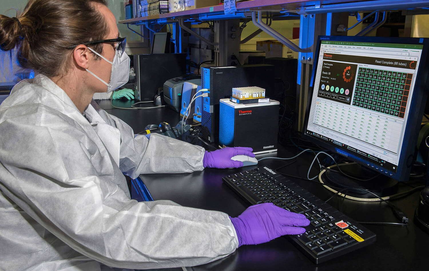 Female Scientist Using Computer